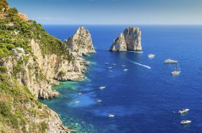 Faraglioni cliffs panorama,and the majestic Tyrrhenian sea,Capri island,Italy,Europe