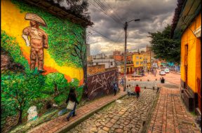 Another image of a street in La Candelaria neighborhood in downtown Bogota.

ISO 400, 10mm, f7.1 (1/200, 1/800, 1/2400)  HDR processed in Phototmatix using Details Enhancer. Postprocessed in Photoshop, Imagenomics Noiseware and Nik filters.