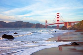 Golden Gate bridge at sunset seen from Marshall Beach, San Francisco.