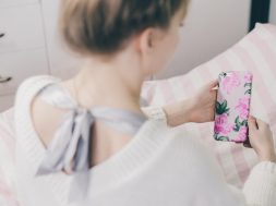 girl_holding_a_phone_in_a_fancy_case