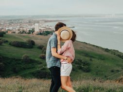 photo-of-woman-and-man-hugging-while-standing-on-grass-1391480