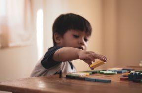 boy-holding-block-toy-1598122