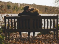 photo-of-couple-sitting-on-bench-3404388