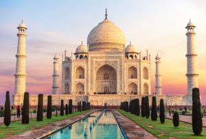 Beautiful Taj Mahal at sunrise and its reflection, India, Agra