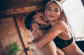 Xxx life satisfaction joy valentine day. Closeup photo of affectionate delicate cuddling beautiful bob blond haired lady feeling good near bearded romantic handsome sweetheart shirtless gentle guy.