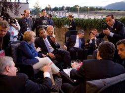 President Barack Obama confers with world leaders, Canadian Prime Minister Stephen Harper, German Chancellor Angela Merkel, British Prime Minister Gordon Brown, Japanese Prime Minister Taro Aso, Italian Prime Minister Silvio Berlusconi, and French President Nicolas Sarkozy, while attending the G-8 summit in L'Aquila, Italy, July 8, 2009. 
(Official White House Photo by Pete Souza)

This official White House photograph is being made available for publication by news organizations and/or for personal use printing by the subject(s) of the photograph. The photograph may not be manipulated in any way or used in materials, advertisements, products, or promotions that in any way suggest approval or endorsement of the President, the First Family, or the White House.